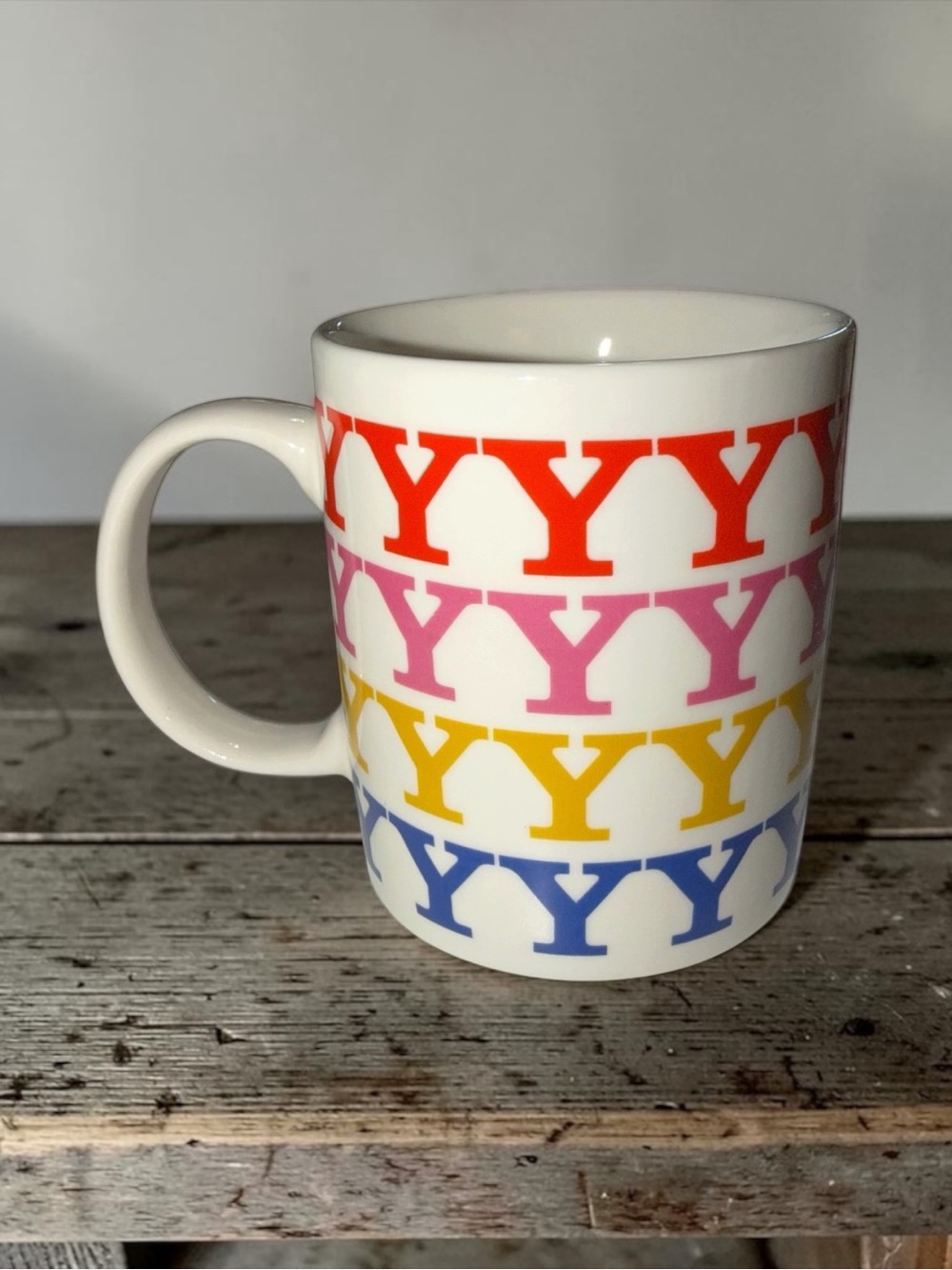 Ashland White Ceramic Mug with Red, Pink, Yellow and Blue 'Y' Pattern